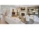 Cozy living room featuring a fireplace, built-in shelving, and comfortable furnishings at 307 Rockledge Sw Bnd, Powder Springs, GA 30127