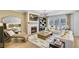 Spacious living room with fireplace, built-in shelves, and modern, neutral decor at 307 Rockledge Sw Bnd, Powder Springs, GA 30127