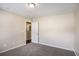 Neutral bedroom featuring carpet and a doorway view to another room at 3459 Village Park Sw Ln, Atlanta, GA 30331