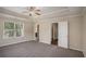 Spacious bedroom features tray ceiling, carpet and natural light at 3459 Village Park Sw Ln, Atlanta, GA 30331