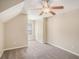 Comfortable bedroom with a ceiling fan, carpet, and a window offering natural light at 3459 Village Park Sw Ln, Atlanta, GA 30331