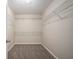 Walk-in closet features wire shelving and carpet at 3459 Village Park Sw Ln, Atlanta, GA 30331