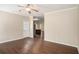 Open living room featuring hardwood floors and a doorway view to the kitchen at 3459 Village Park Sw Ln, Atlanta, GA 30331