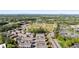 An aerial view of modern townhomes nestled in a lush, green landscape with mountain views at 938 Catamaran Ct, Alpharetta, GA 30005
