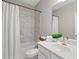 Bathroom features a marble tiled shower and vanity with sink at 938 Catamaran Ct, Alpharetta, GA 30005