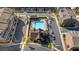 Aerial view of the community pool and lounge area, surrounded by lush landscaping at 938 Catamaran Ct, Alpharetta, GA 30005