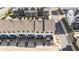 A close aerial view of modern townhomes featuring private balconies and ground-level parking at 938 Catamaran Ct, Alpharetta, GA 30005