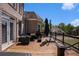 Enjoy outdoor dining on this spacious deck with a barbecue area and scenic views at 1950 Lancaster Se Dr, Conyers, GA 30013