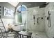Beautiful bathroom featuring a soaking tub, walk-in shower, and natural light at 1950 Lancaster Se Dr, Conyers, GA 30013