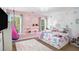 Fun bedroom with themed decor, natural light, and playful accents at 1950 Lancaster Se Dr, Conyers, GA 30013