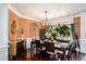 Dining room with a dining table, hardwood floors and decorative plants at 1950 Lancaster Se Dr, Conyers, GA 30013