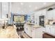Beautiful kitchen with island cooktop, granite countertops, and stainless steel appliances at 1950 Lancaster Se Dr, Conyers, GA 30013