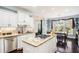 Eat-in kitchen boasts stainless appliances, granite countertops, and a breakfast nook at 1950 Lancaster Se Dr, Conyers, GA 30013
