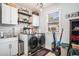 Convenient laundry room with modern washer and dryer, sink, and storage at 1950 Lancaster Se Dr, Conyers, GA 30013