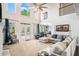 Spacious living room features lots of natural light, high ceilings, and plush seating at 1950 Lancaster Se Dr, Conyers, GA 30013