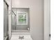Bathroom with new tile, and shower at 2804 Dearwood Sw Dr, Atlanta, GA 30315