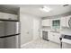 Kitchen features new stainless appliances, crisp paint, white cabinets and stainless appliances at 2804 Dearwood Sw Dr, Atlanta, GA 30315