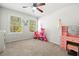 Bedroom featuring a desk and ceiling fan at 309 Vista Ln, Woodstock, GA 30189