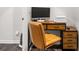 Cozy office space featuring a modern desk, chair, computer, and storage for a productive work environment at 309 Vista Ln, Woodstock, GA 30189