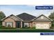 Charming brick home with a two-car garage and well-manicured lawn at 5007 Fairview Cir, Villa Rica, GA 30180