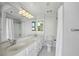 Bathroom with double sinks, large mirror, and shower/tub combination at 3481 Lakeside Ne Dr # 907, Atlanta, GA 30326