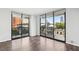 Bright bedroom featuring large windows with city views, flooding the room with natural light at 3481 Lakeside Ne Dr # 907, Atlanta, GA 30326