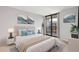 Comfortable bedroom with modern decor and a private balcony access at 3481 Lakeside Ne Dr # 907, Atlanta, GA 30326