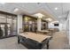 Well-lit game room featuring a pool table, comfortable seating, and a relaxing atmosphere for entertainment at 3481 Lakeside Ne Dr # 907, Atlanta, GA 30326