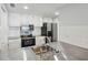 Well-lit kitchen featuring stainless steel appliances, white cabinets, and an undermount sink at 3481 Lakeside Ne Dr # 907, Atlanta, GA 30326
