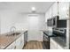 Updated kitchen featuring modern appliances and stylish countertops at 3481 Lakeside Ne Dr # 907, Atlanta, GA 30326