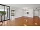 Spacious living room with hardwood floors, recessed lighting, and access to the balcony at 3481 Lakeside Ne Dr # 907, Atlanta, GA 30326