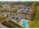 Scenic aerial view of the neighborhood showing the community pool, clubhouse, and ample parking at 408 Brighton Pt, Atlanta, GA 30328