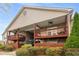 Charming condo exterior with a wood-fenced ground floor and pleasant balconies with fans at 408 Brighton Pt, Atlanta, GA 30328