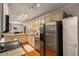 Kitchen with granite counters, stainless appliances, and ample cabinet storage at 408 Brighton Pt, Atlanta, GA 30328