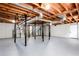 Spacious unfinished basement with visible ductwork and support beams, ready for customization and finishing to your taste at 4506 Dorset Dr, Decatur, GA 30035