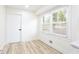 Neutral bedroom with large windows and a view of the trees at 4506 Dorset Dr, Decatur, GA 30035