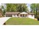 Charming renovated ranch home with a freshly painted exterior and manicured lawn at 4506 Dorset Dr, Decatur, GA 30035