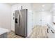 Bright kitchen with stainless steel refrigerator and ample cabinet space at 4506 Dorset Dr, Decatur, GA 30035