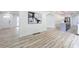 Open concept living space with hardwood floors, white trim, and modern finishes throughout at 4506 Dorset Dr, Decatur, GA 30035