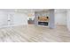 Open concept living room featuring a modern fireplace and hardwood floors at 4506 Dorset Dr, Decatur, GA 30035