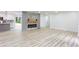 Bright living room featuring hardwood floors and a view into the updated kitchen at 4506 Dorset Dr, Decatur, GA 30035
