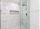 Close-up of the walk-in shower featuring glass door and rainfall shower head at 4506 Dorset Dr, Decatur, GA 30035