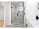 Walk-in shower featuring glass door, modern fixtures, and beautiful tiling at 4506 Dorset Dr, Decatur, GA 30035