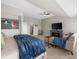 Bright bedroom with stylish decor, comfortable seating, and a large bed for a relaxing retreat at 6088 Holly Park Se Ln, Mableton, GA 30126