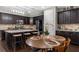 Modern kitchen features stainless steel appliances, spacious island with seating, and granite counter tops at 6088 Holly Park Se Ln, Mableton, GA 30126