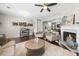 Bright living room with fireplace, modern furnishings and decor provides welcoming ambiance at 6088 Holly Park Se Ln, Mableton, GA 30126
