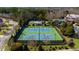 Aerial view of the neighborhood tennis courts and well-maintained landscaping at 6088 Holly Park Se Ln, Mableton, GA 30126