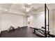 Basement workout area features black rubber floors, exercise equipment, and bright lighting at 1900 Denton Walk Ct, Marietta, GA 30062