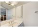Bathroom featuring vanity with sink, mirror, and medicine cabinet at 1900 Denton Walk Ct, Marietta, GA 30062