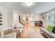 Open living room with hardwood floors, neutral walls, and classic trim at 1900 Denton Walk Ct, Marietta, GA 30062